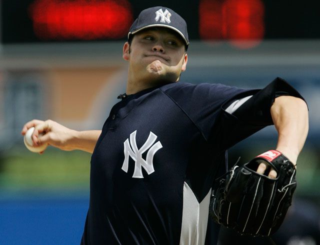 Joba Chamberlain throwing against the Tigers
